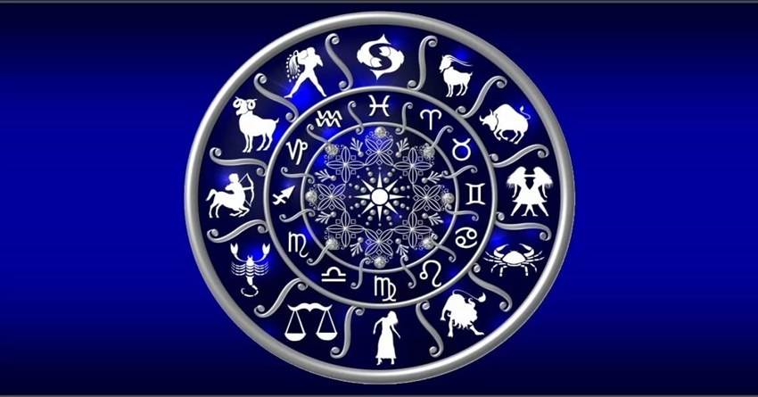 Detail of a metal pocket watch with horoscope design